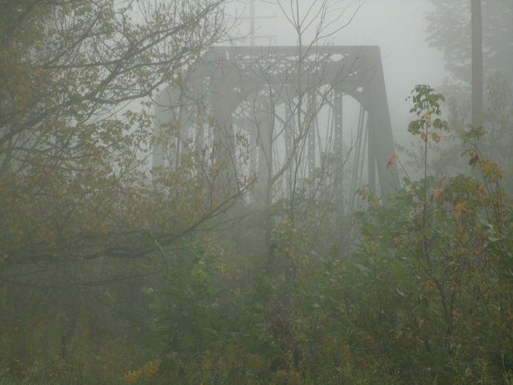 Iron train bridge in foggy Lewis County West Virginia