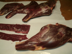 white tail deer meat ready to be deboned