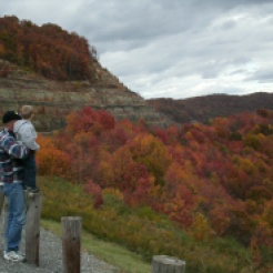 Fall folage on hwy 19 in Fayette county West Virginia ...Tom holding Christopher