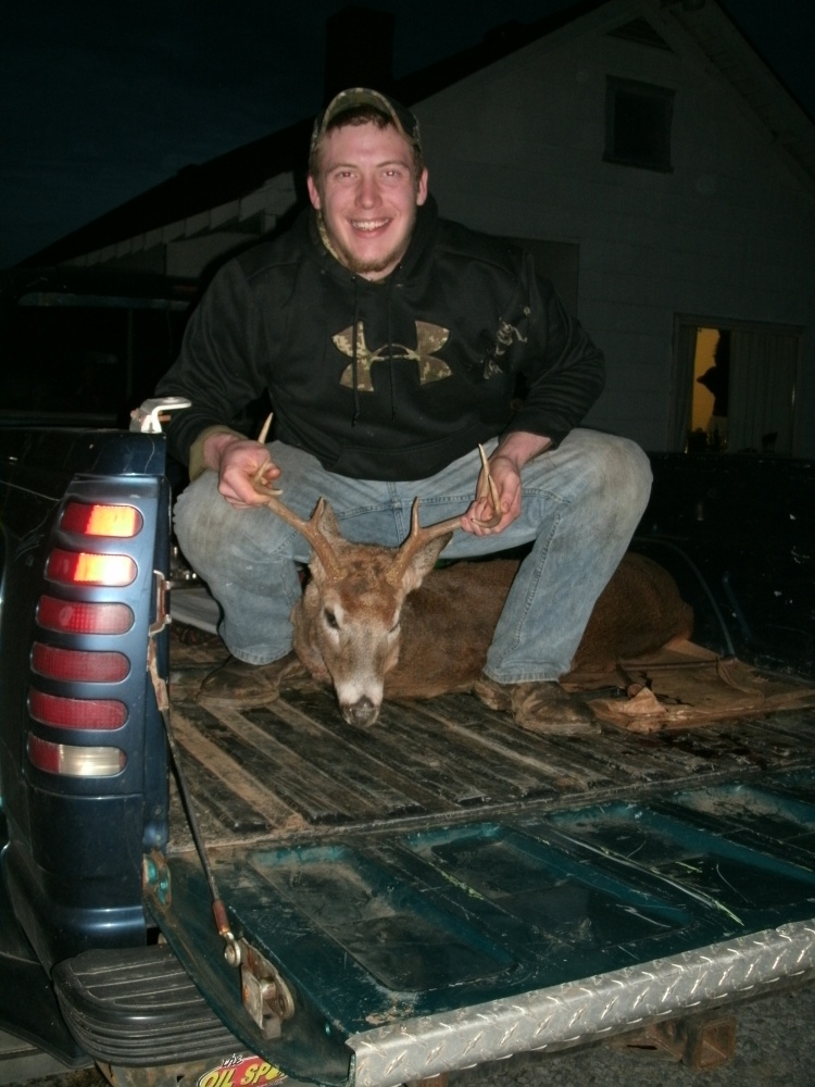 Cody Powers with his 8 point buck Nov 2013