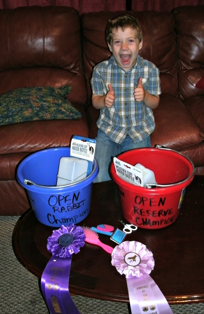 Christopher with ribbons and prizes from the 2014 4-H jamboree