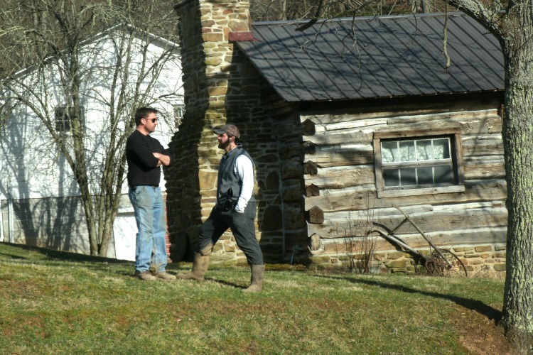 Actor Mark Bowe talking with the Director of Barnwood builders
