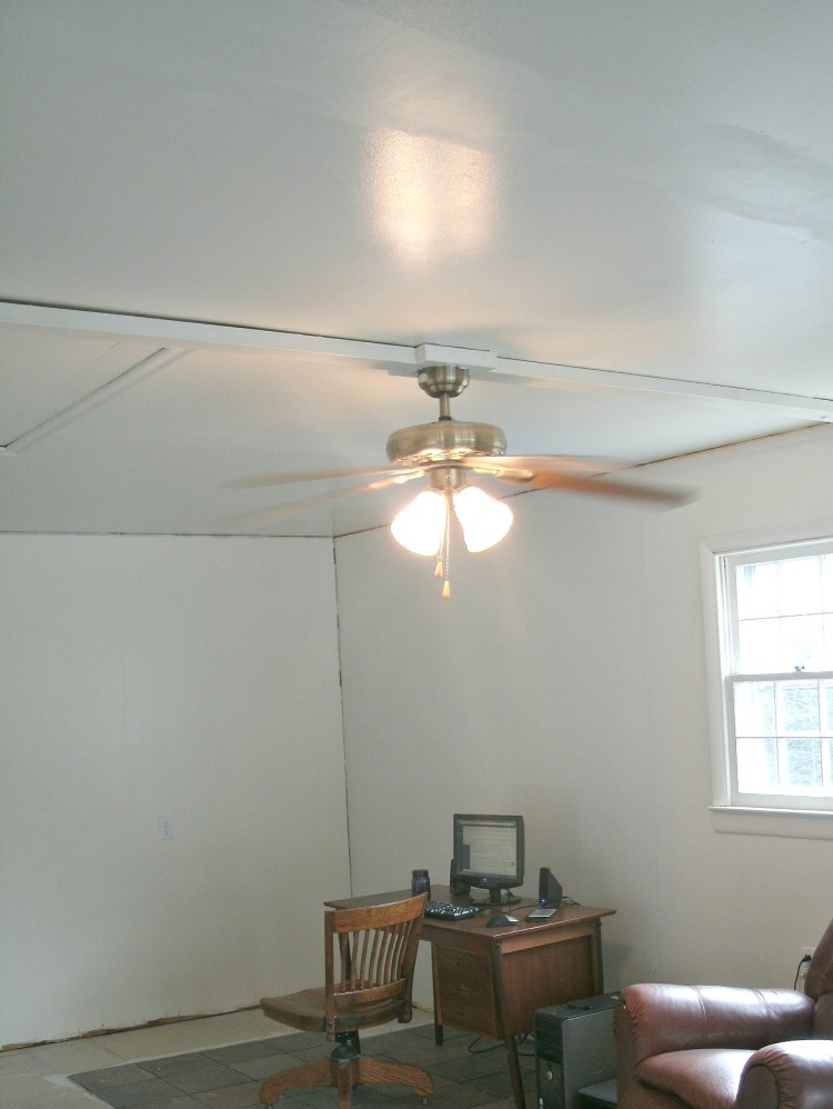 Ceiling repair finished for now and wall painted white