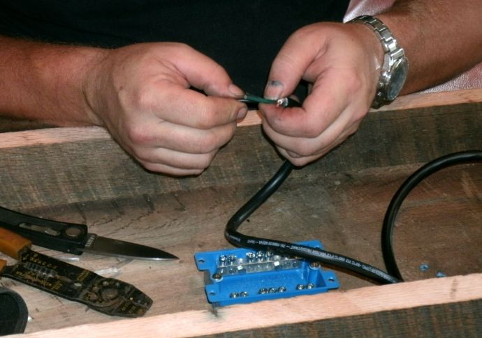 Tom wiring in light cords into shallow wiring box