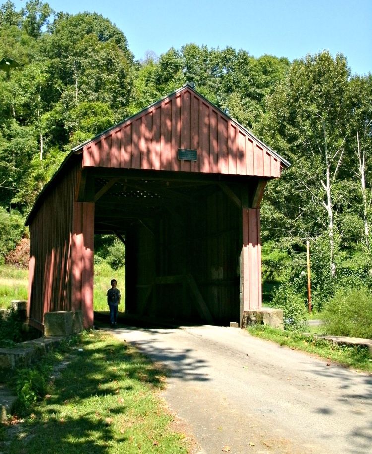 front of the Walkersville Covered Bridge in Lewis County West Virginia