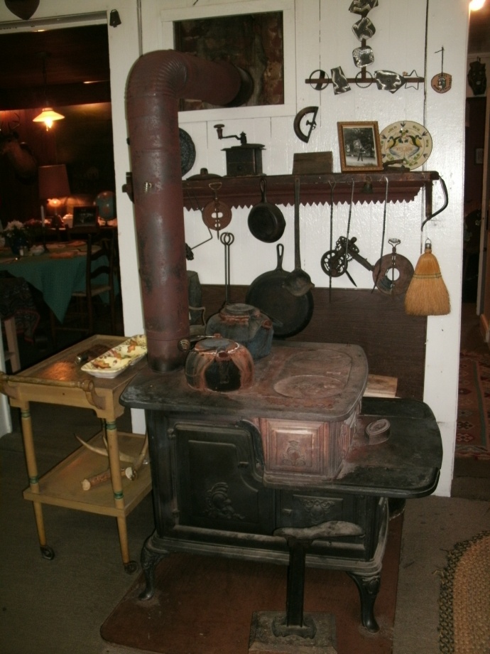 Wood stove used to heat our dinning room at the Hutte House Swiss Restraunt