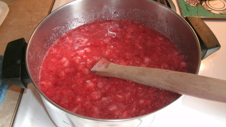 8 cups mashed strawberries, lemon juice, pectin ready to boil